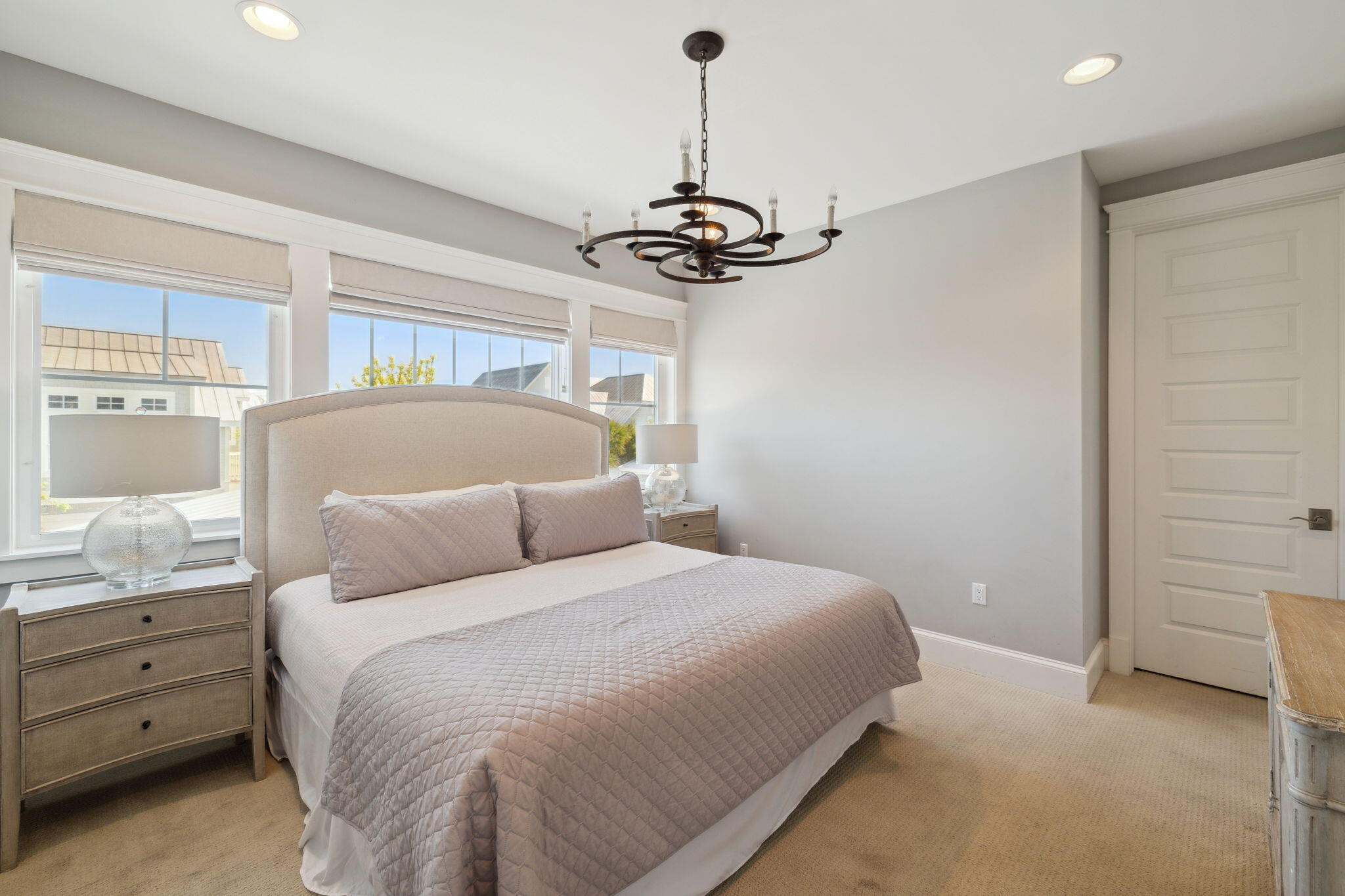 89 Clipper Street Inlet Beach, FL 32461 - Photo 42 of 72 a bedroom with a bed and a ceiling fan