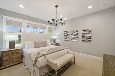 a view of a street with palm trees