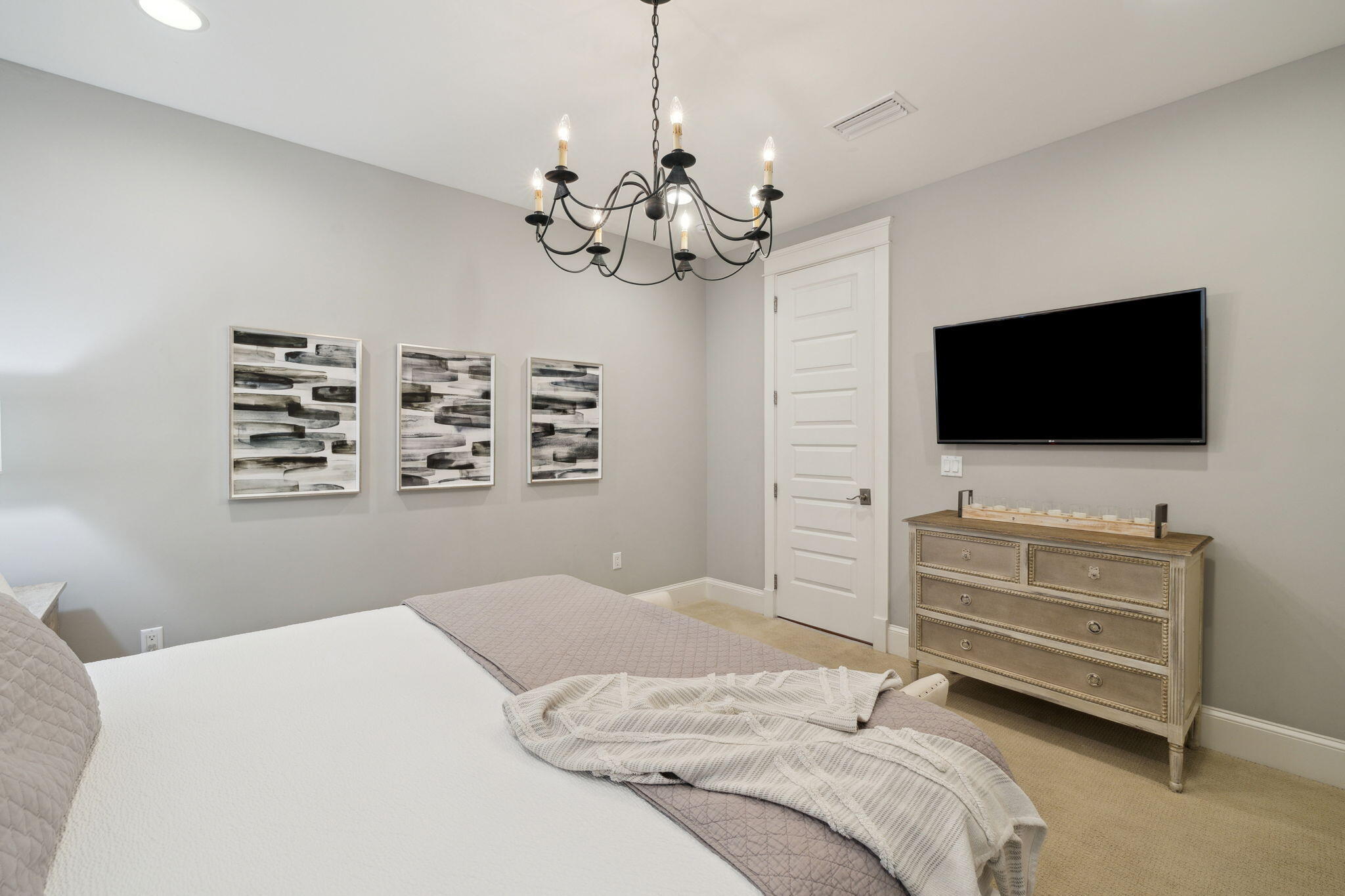 89 Clipper Street Inlet Beach, FL 32461 - Photo 48 of 72 a bedroom with a bed and a flat screen tv