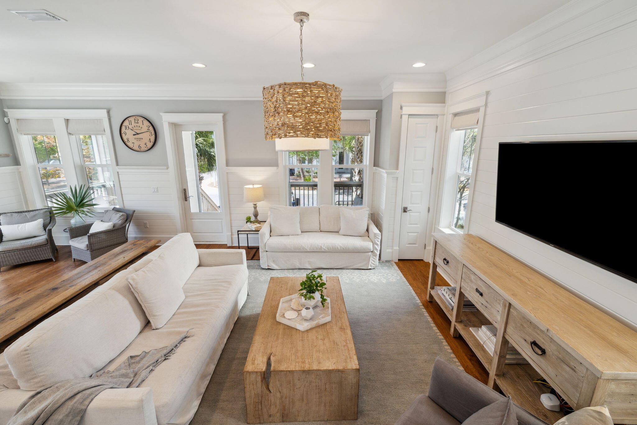 89 Clipper Street Inlet Beach, FL 32461 - Photo 50 of 72 a living room with furniture and a flat screen tv