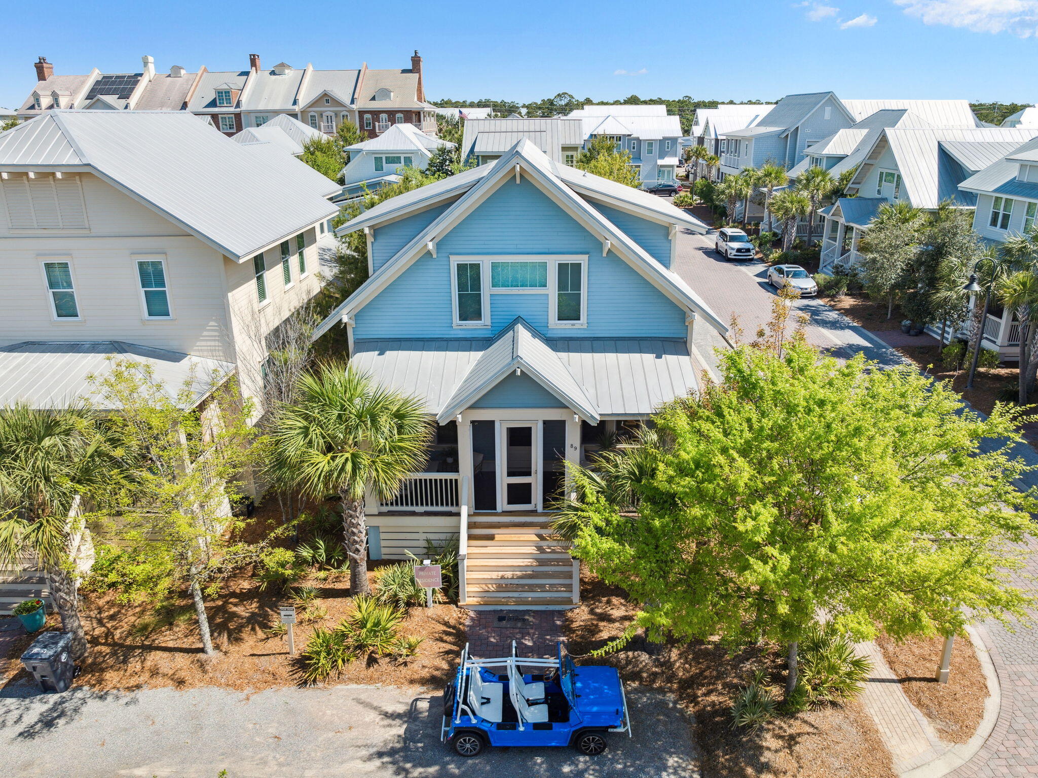 89 Clipper Street Inlet Beach, FL 32461 - Photo 8 of 72 a front view of a house with garden