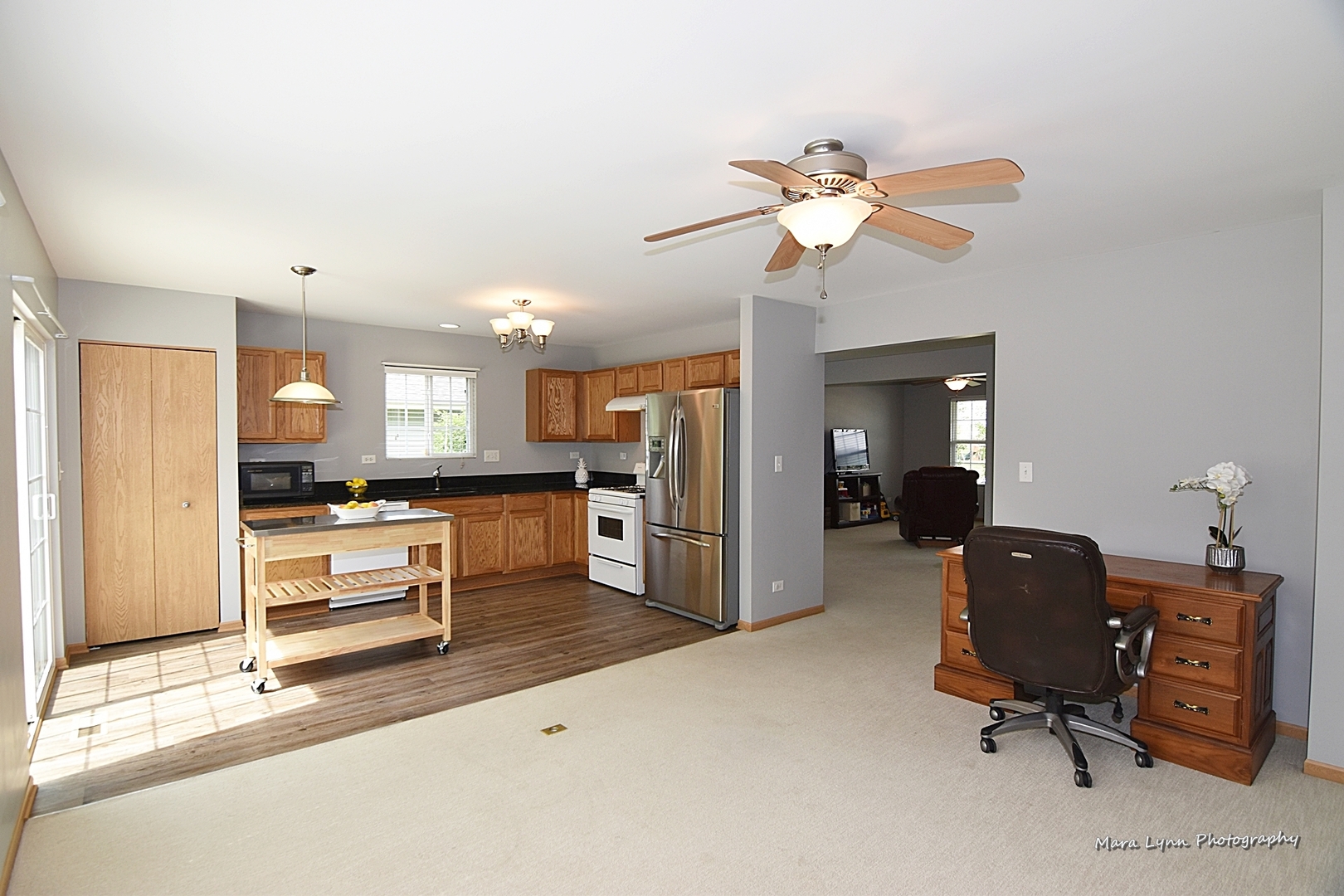 1125 Bailey Road Sycamore, IL 60178 - Photo 13 of 30 a view of a livingroom with workspace and a window