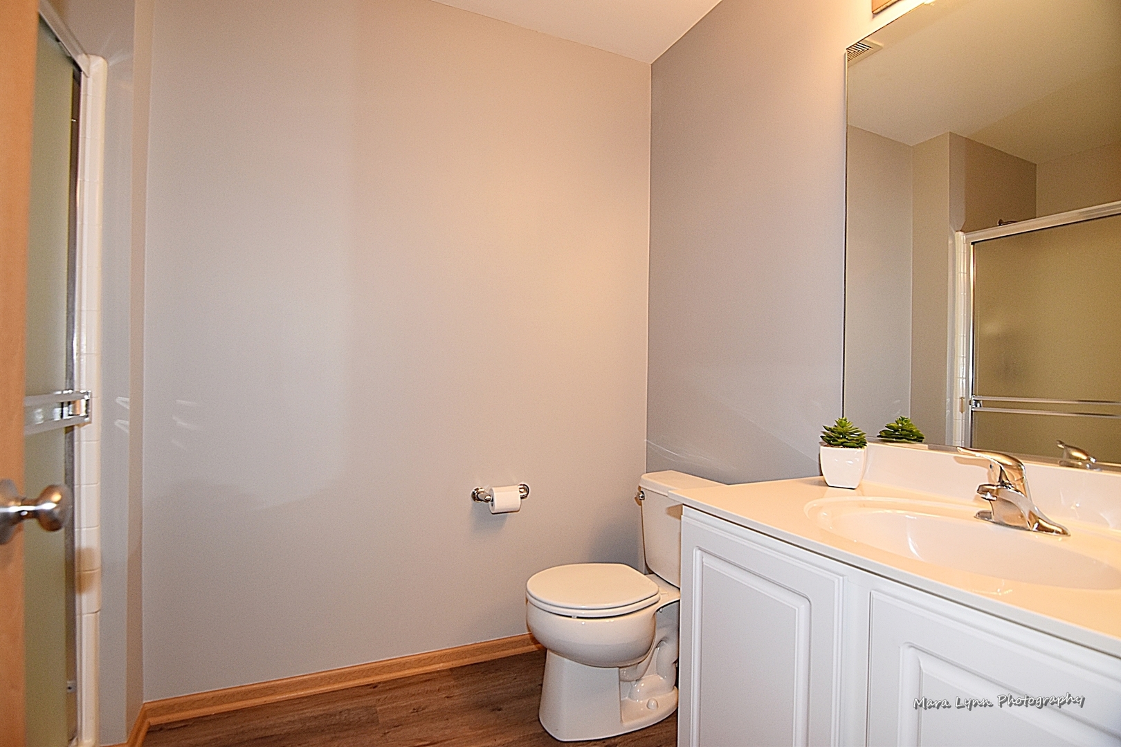 1125 Bailey Road Sycamore, IL 60178 - Photo 16 of 30 a bathroom with a sink and a toilet