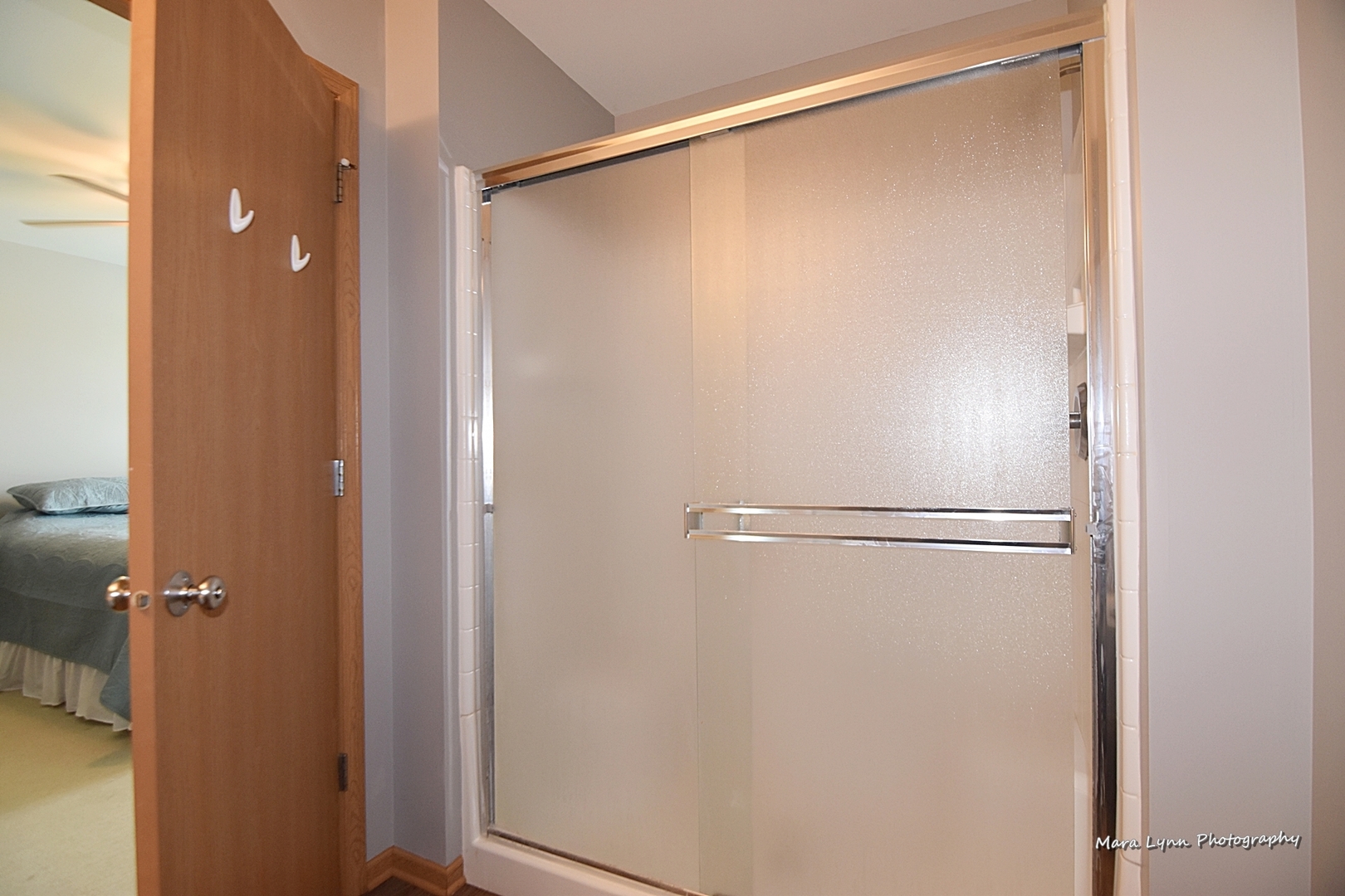 1125 Bailey Road Sycamore, IL 60178 - Photo 17 of 30 a bathroom with a glass shower door