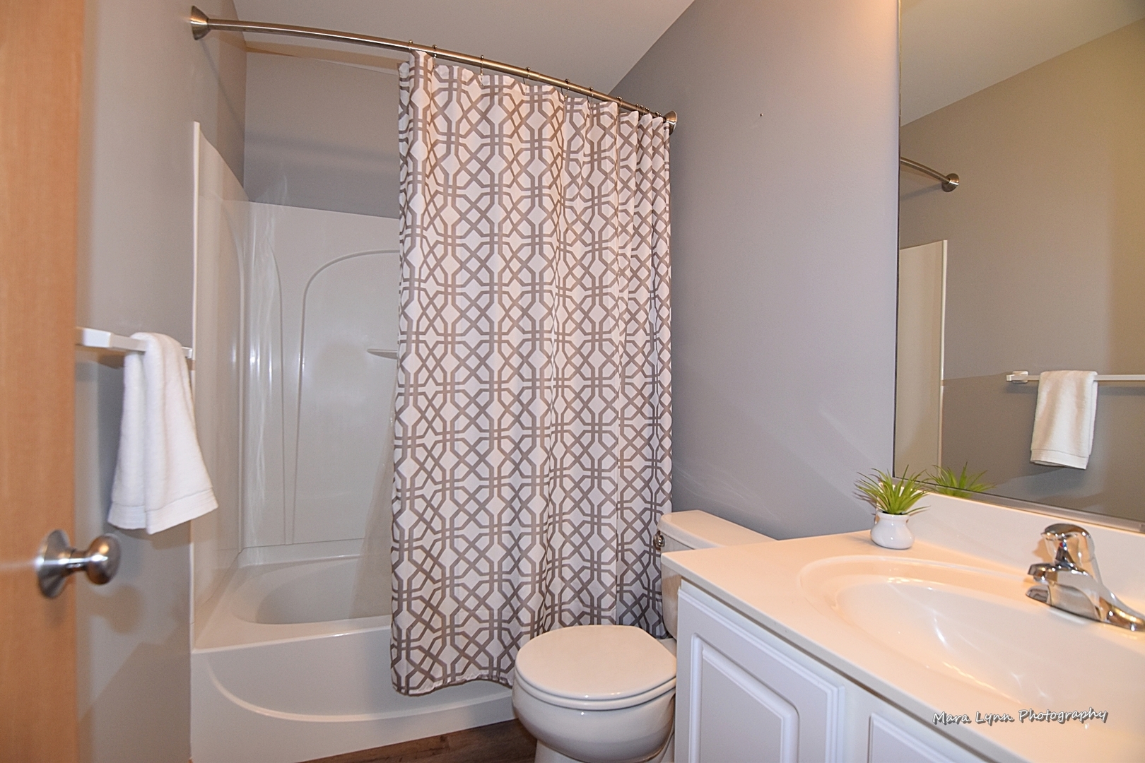 1125 Bailey Road Sycamore, IL 60178 - Photo 22 of 30 a bathroom with a sink toilet and shower