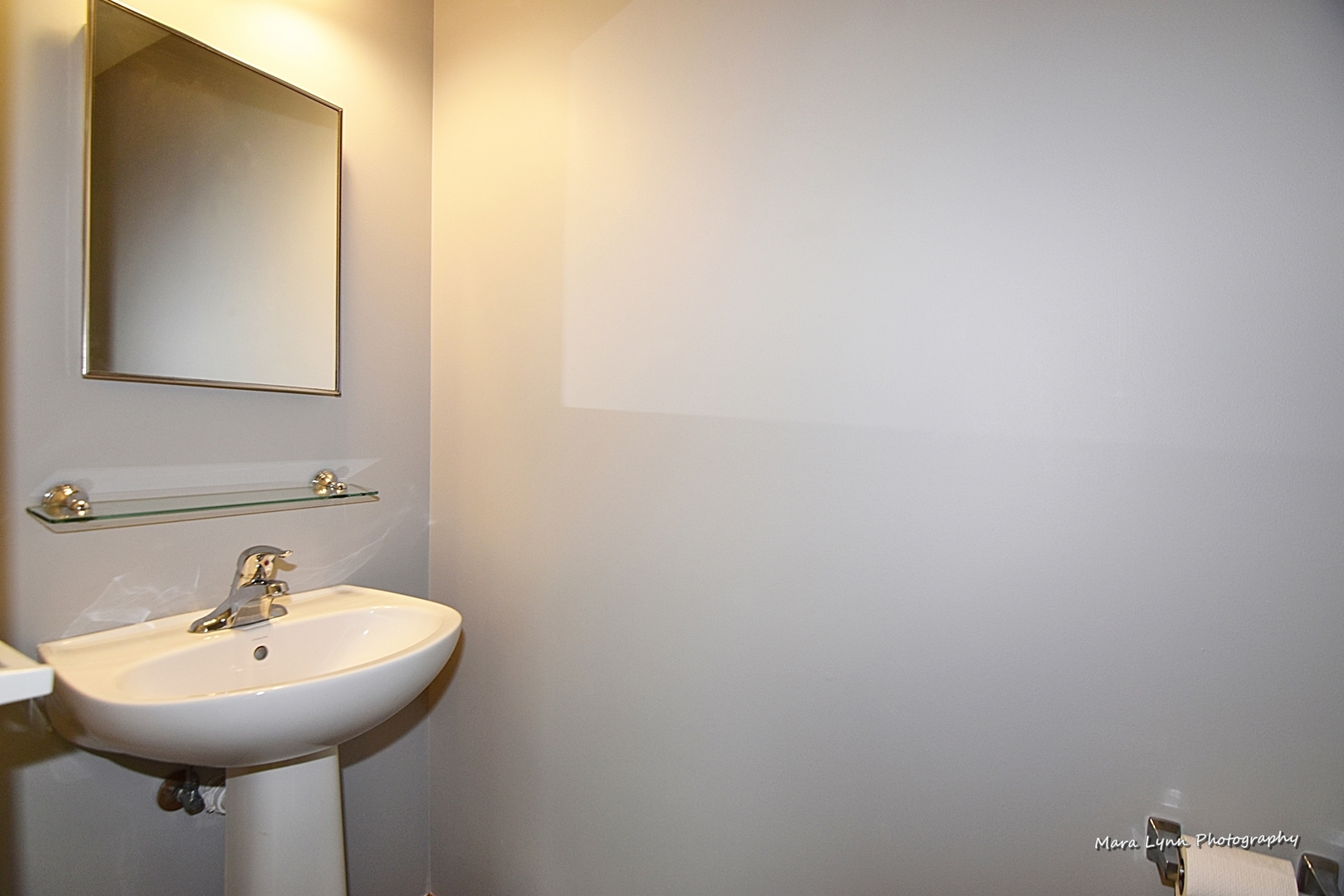 1125 Bailey Road Sycamore, IL 60178 - Photo 25 of 30 a bathroom with a sink and mirror
