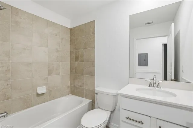 a bathroom with a sink toilet and bathtub