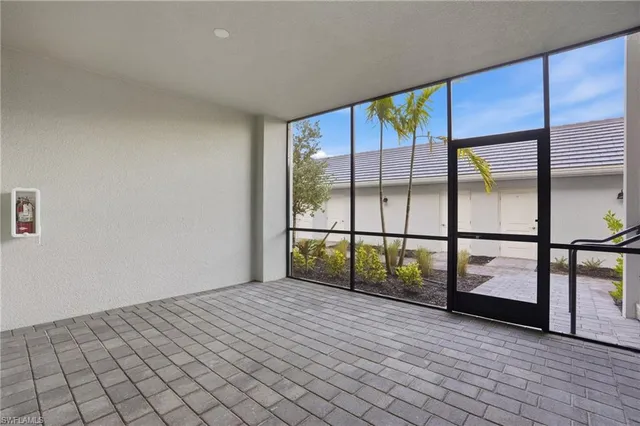 a view of front door with wooden floor
