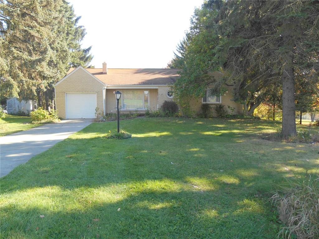 1098 Mercer Rd Front View nice level yard attached garage and concrete drive with turn around.