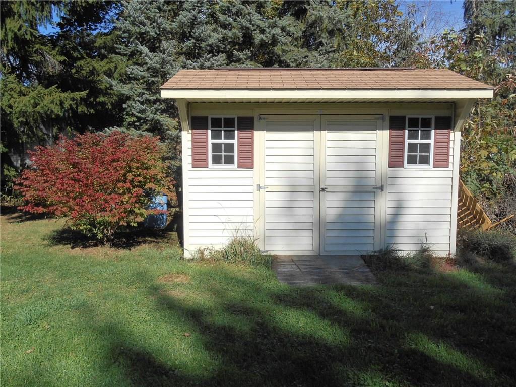 1098 Mercer Road Beaver Falls, PA 15010 - Photo 15 of 18 Store all your lawn equipment in your double door shed.