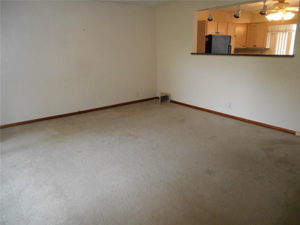 Living Room with opening into kitchen.