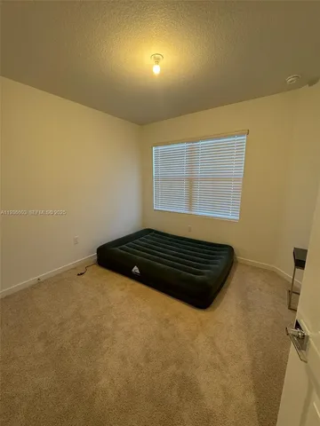 a bathroom with a sink and a window