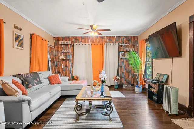 a kitchen with stainless steel appliances granite countertop a refrigerator and a stove