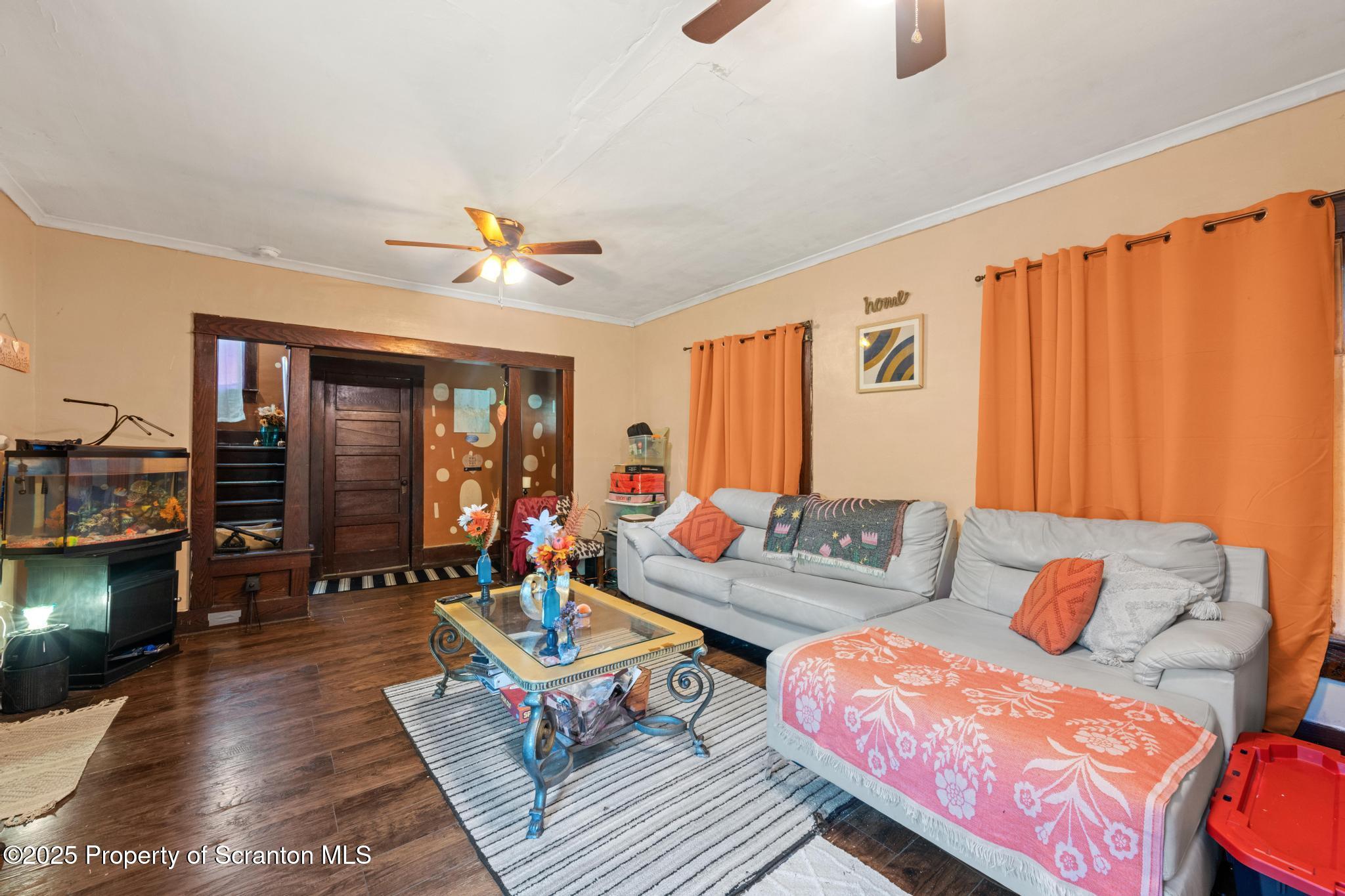 70 State Street Nicholson, PA 18446 - Photo 16 of 64 a living room with furniture and wooden floor