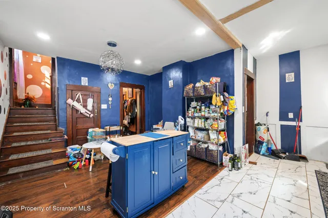 a bathroom with a bathtub and shower