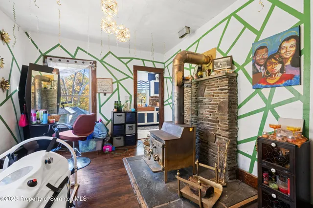 a bedroom with furniture and a chandelier