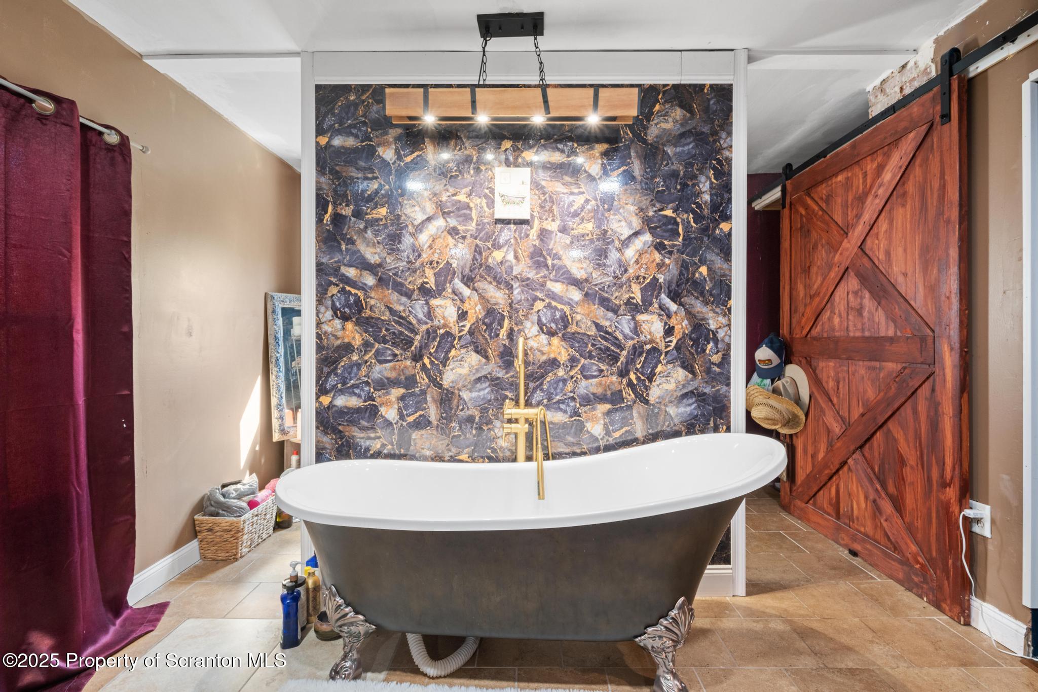 70 State Street Nicholson, PA 18446 - Photo 31 of 64 a bathroom with a bathtub and shower