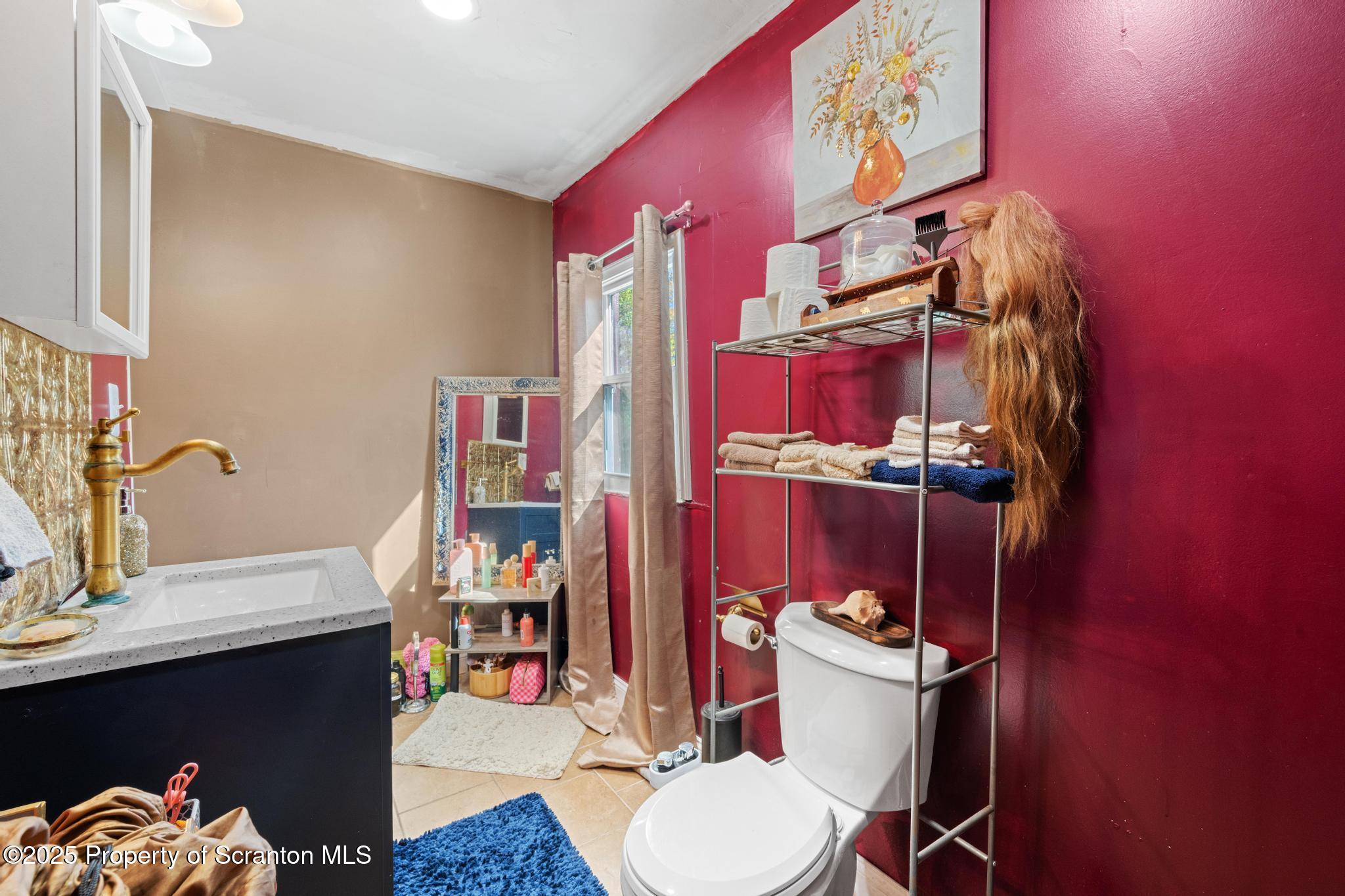 70 State Street Nicholson, PA 18446 - Photo 33 of 64 a bathroom with a sink and a toilet