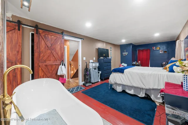 a view of a storage & utility room with washer and dryer