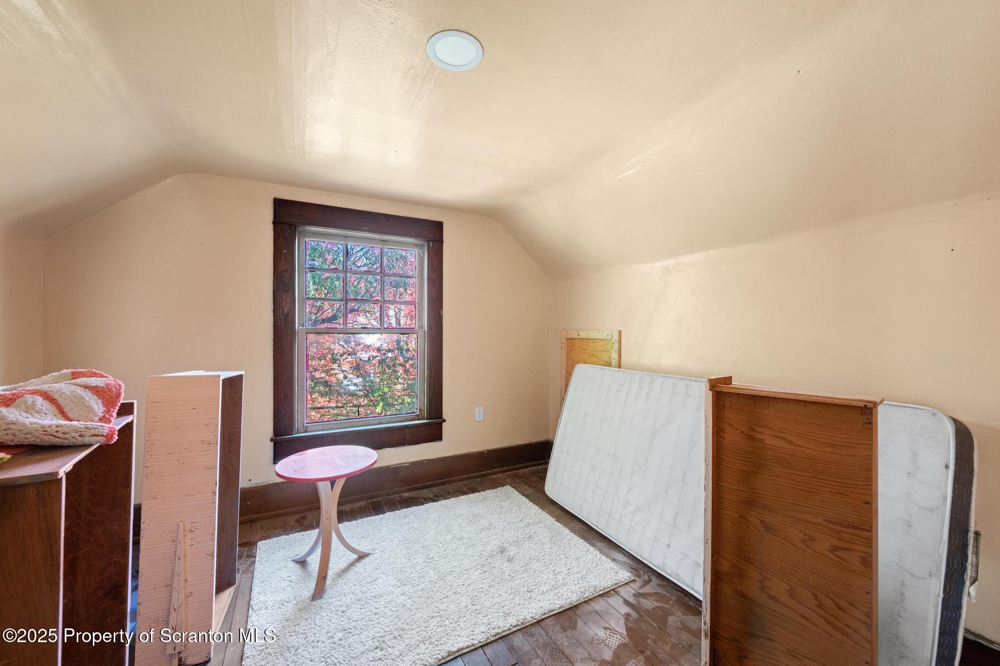 70 State Street Nicholson, PA 18446 - Photo 41 of 64 a living room with furniture and a window