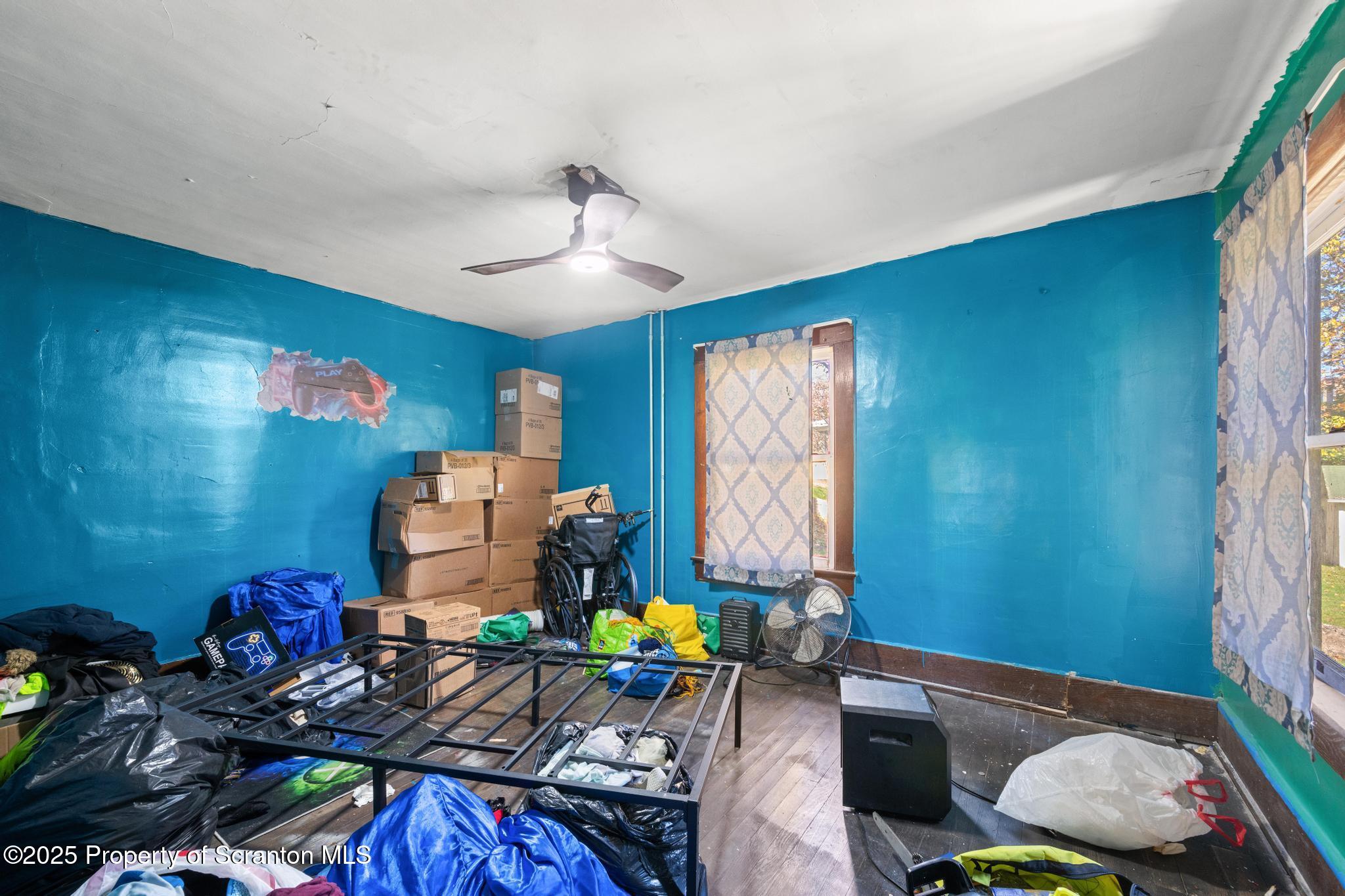 70 State Street Nicholson, PA 18446 - Photo 43 of 64 a living room with furniture and a window