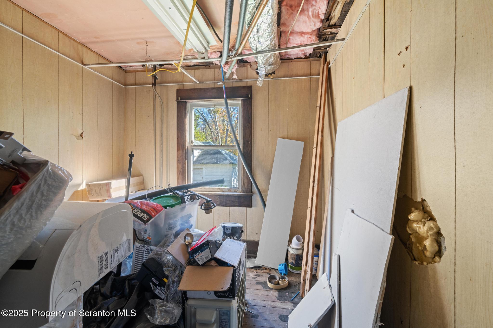 70 State Street Nicholson, PA 18446 - Photo 44 of 64 a view of walk in closet with clothes and shoes
