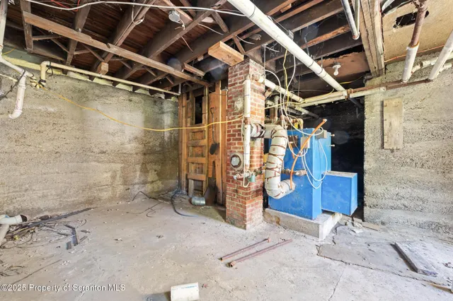 an aerial view of residential house with outdoor space