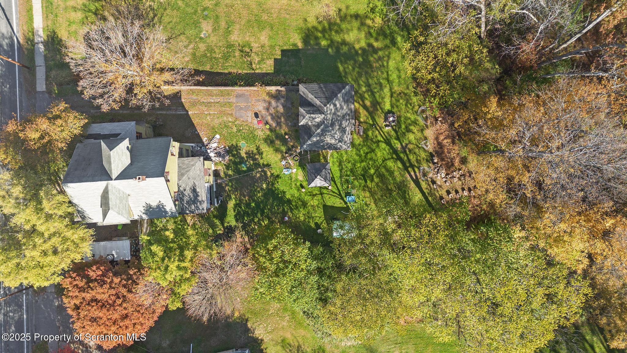70 State Street Nicholson, PA 18446 - Photo 59 of 64 an aerial view of a house with a yard
