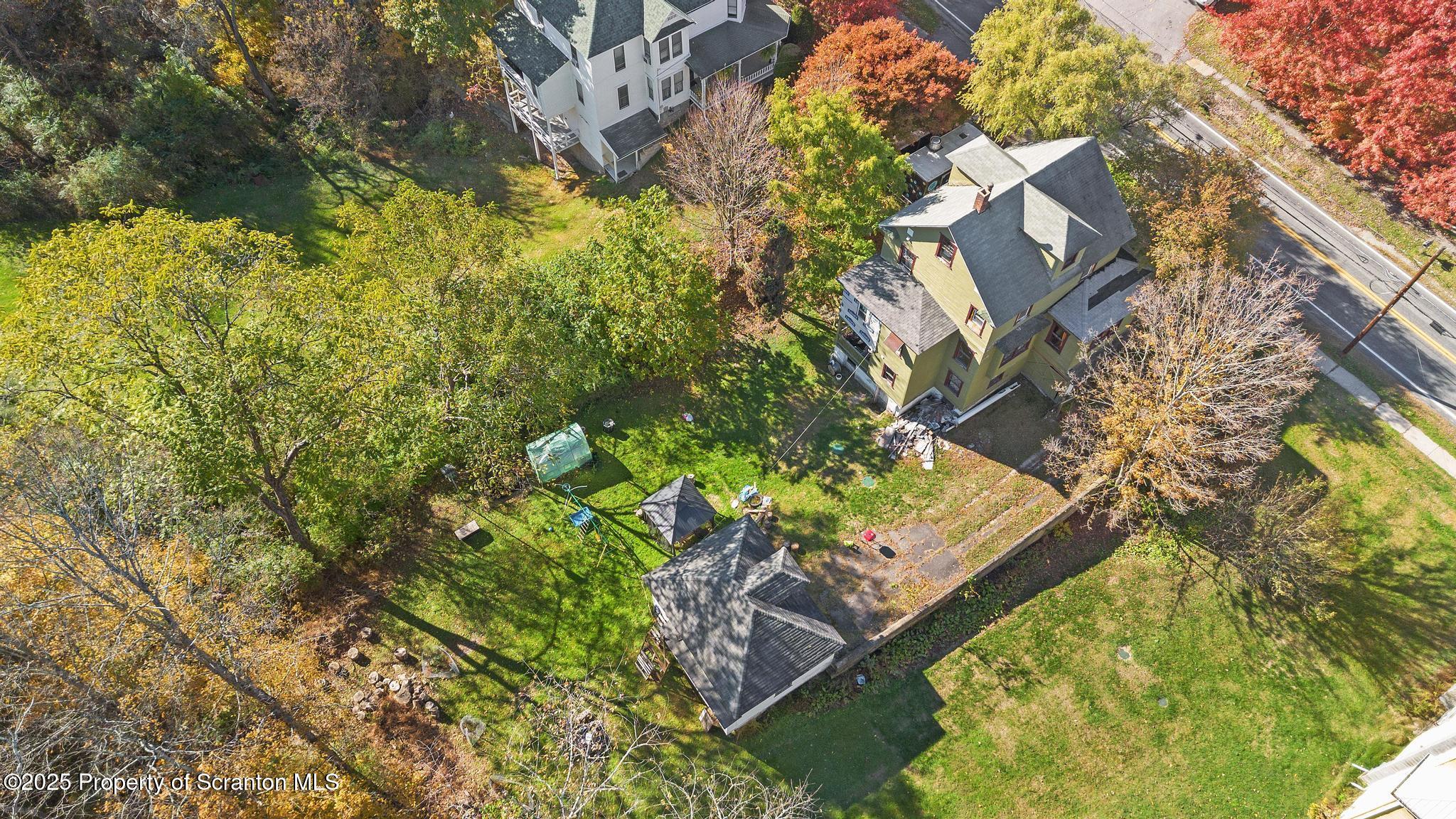 70 State Street Nicholson, PA 18446 - Photo 64 of 64 a view of a house with a yard