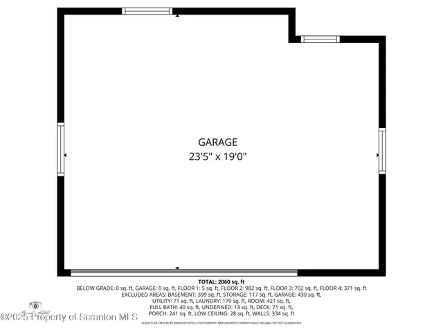 a living room with furniture a large window and wooden floor