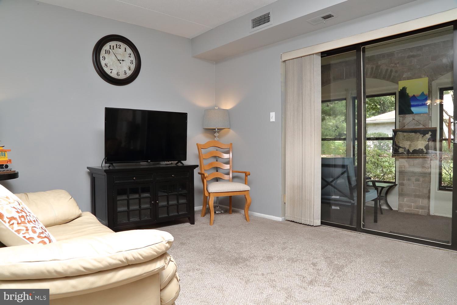 207 Valleybrook Drive Lancaster, PA 17601 - Photo 5 of 22 Step out of living room into enclosed porch