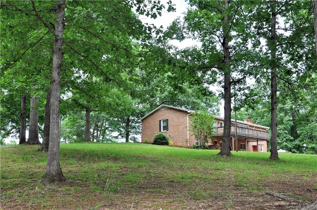 280 Bennett Road Rutherfordton, NC 28139 - Photo 5 of 44 a house view with a garden space