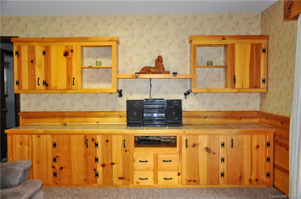 280 Bennett Road Rutherfordton, NC 28139 - Photo 10 of 44 a kitchen with stainless steel appliances granite countertop a stove and a microwave oven