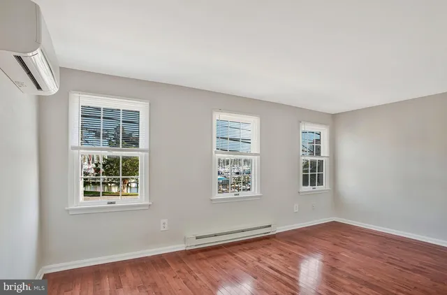 an empty room with windows