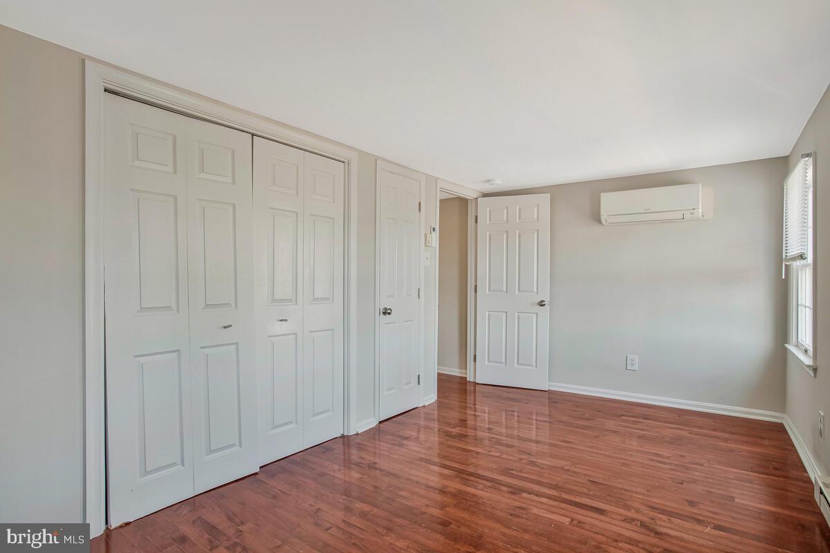 320 Chester Avenue Annapolis, MD 21403 - Photo 29 of 32 a view of an empty room with wooden floor