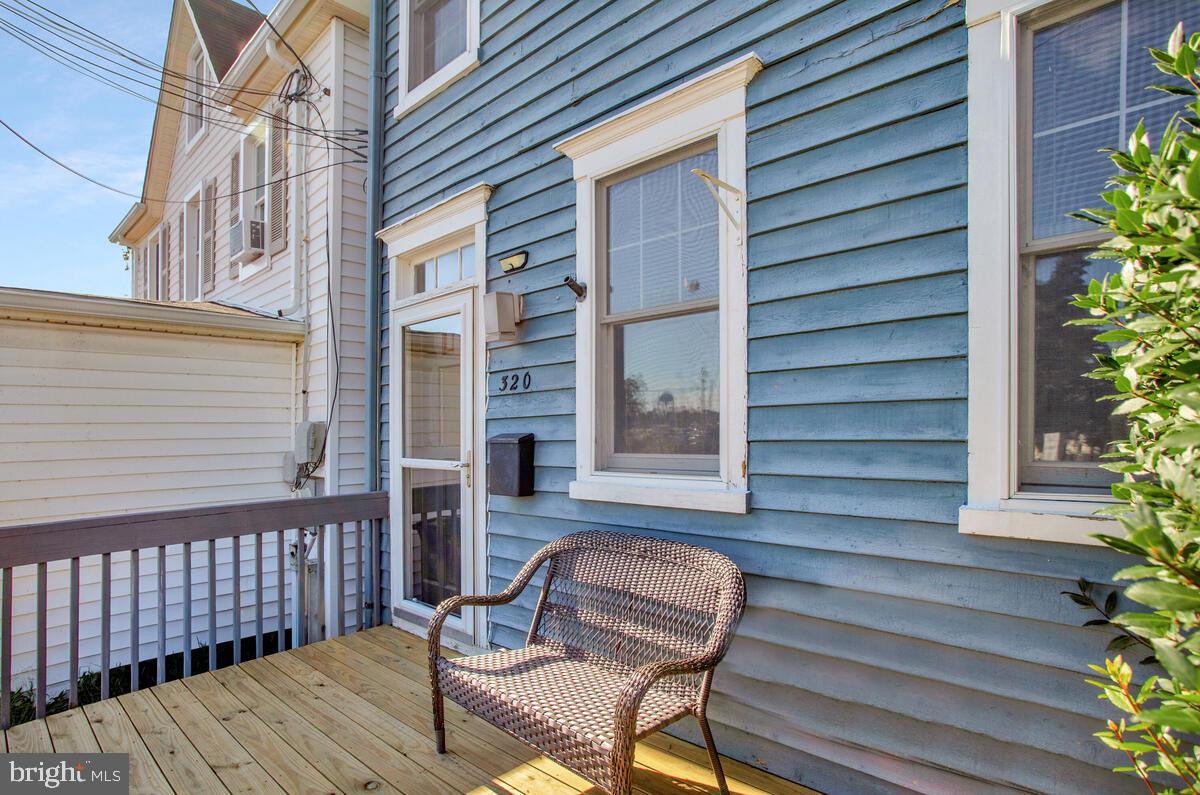 320 Chester Avenue Annapolis, MD 21403 - Photo 3 of 32 a view of a patio with a chairs and table in a patio
