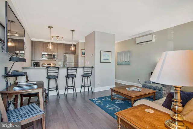 a workspace with furniture and wooden floor