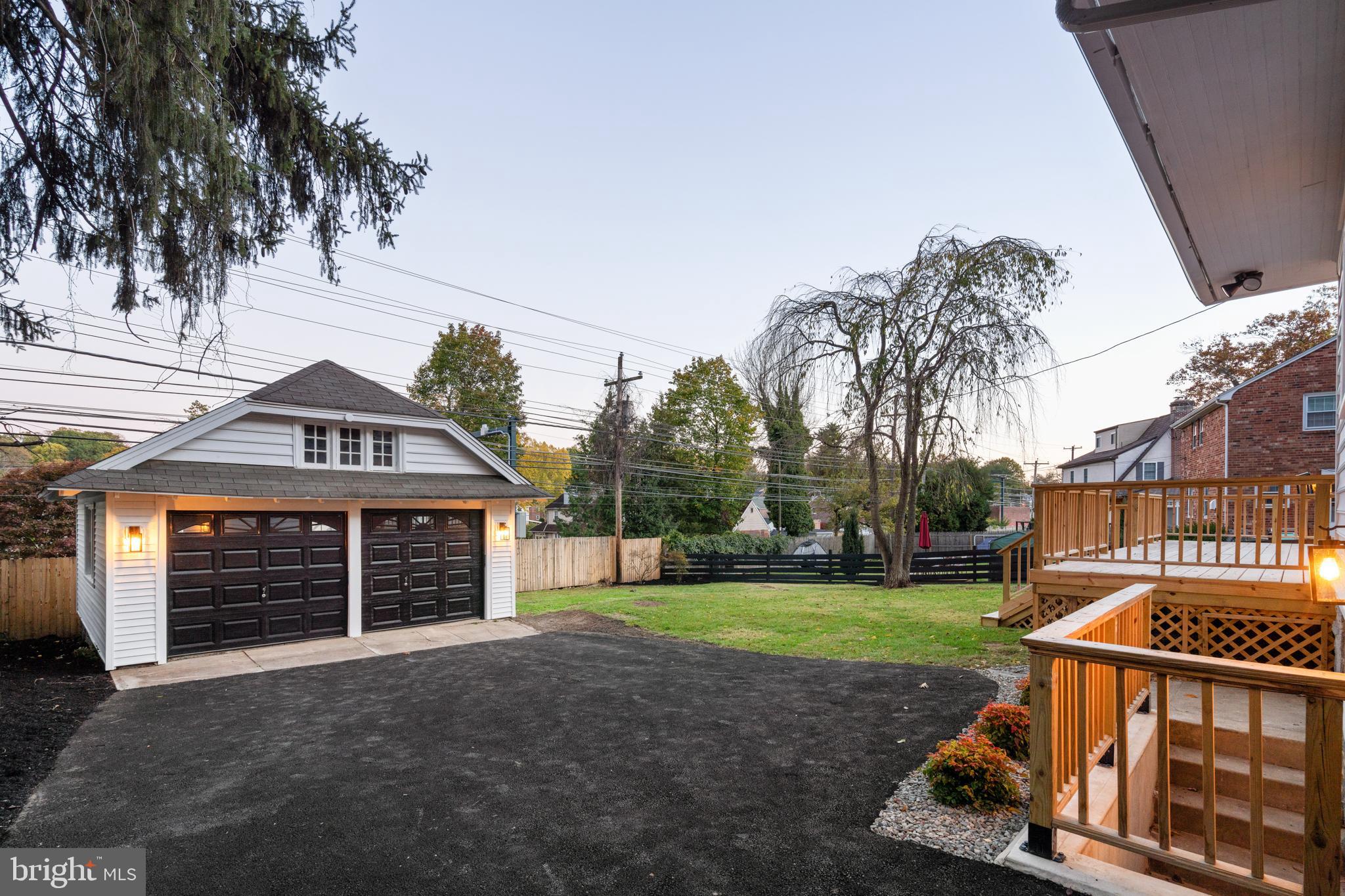 39 North Rolling Road Springfield, PA 19064 - Photo 112 of 119 a view of a house with a yard and potted plants