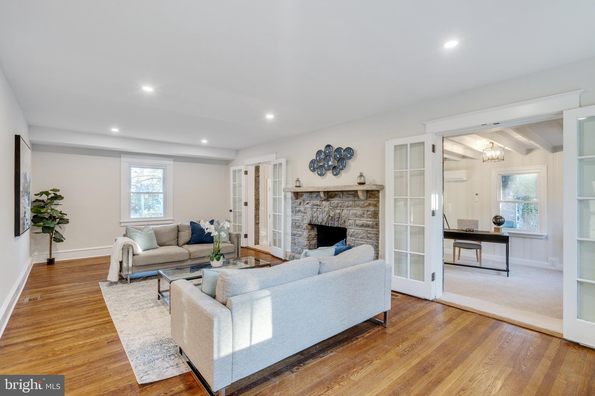 39 North Rolling Road Springfield, PA 19064 - Photo 13 of 119 a living room with furniture and a fireplace