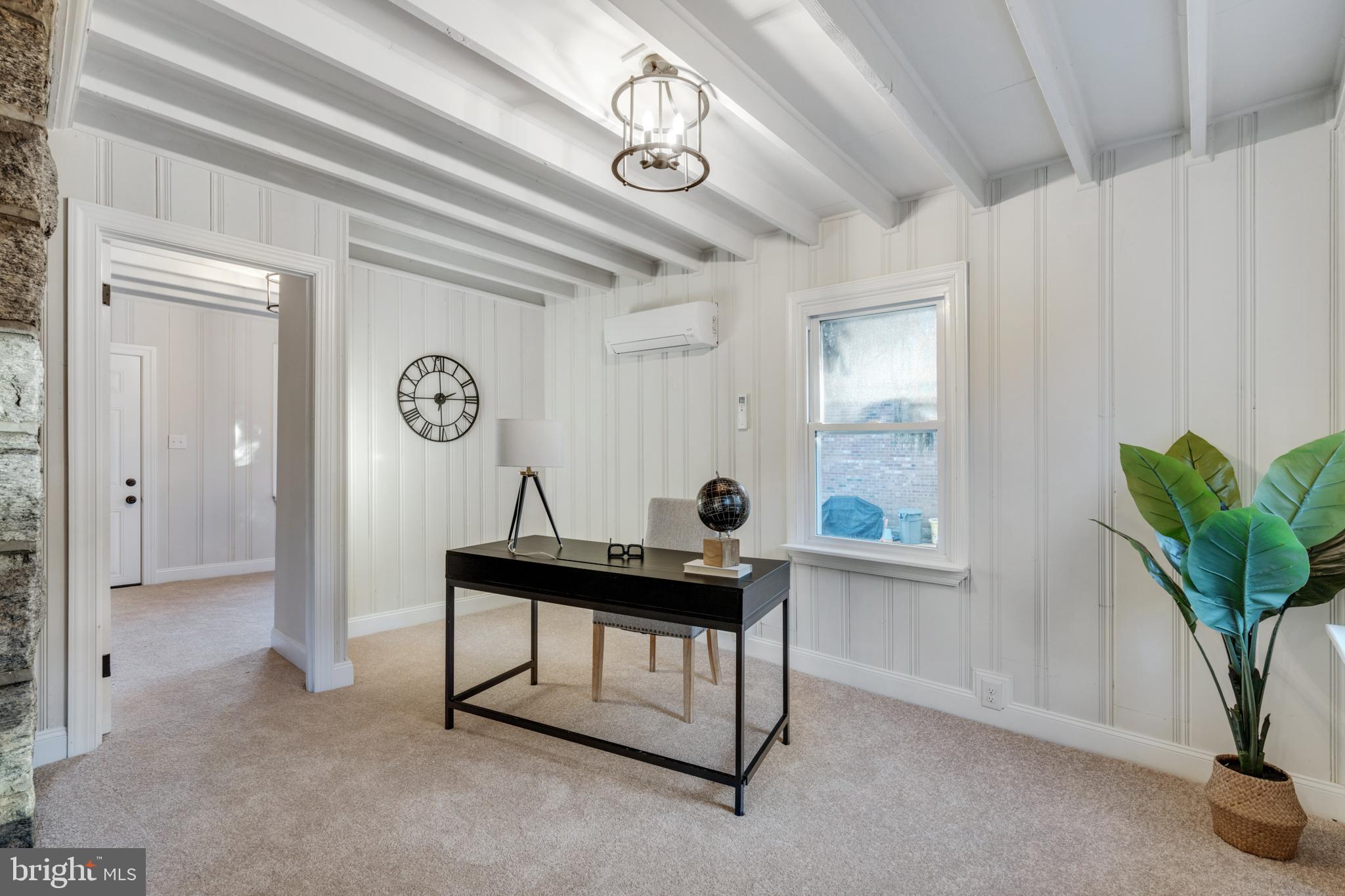 39 North Rolling Road Springfield, PA 19064 - Photo 21 of 119 a view of a workspace with furniture and a window