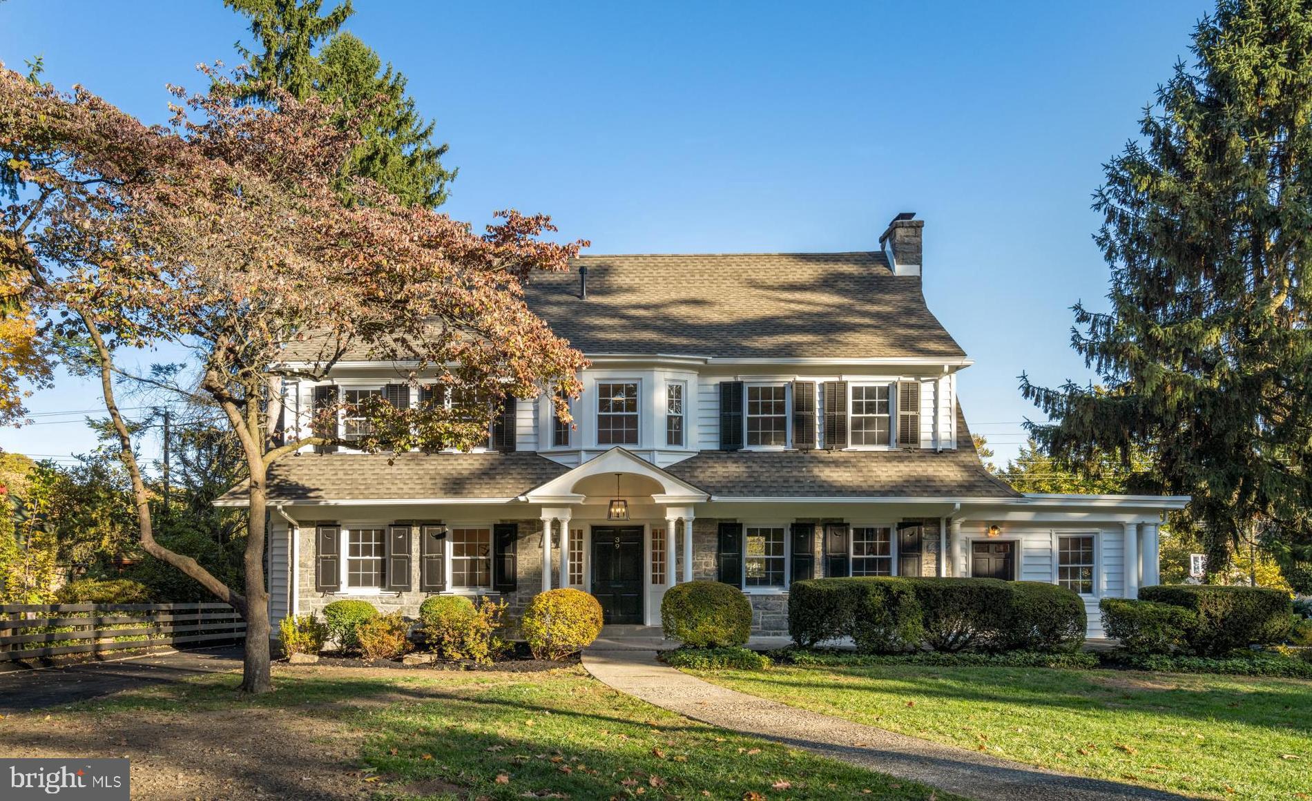 39 North Rolling Road Springfield, PA 19064 - Photo 5 of 119 a front view of a house with a garden