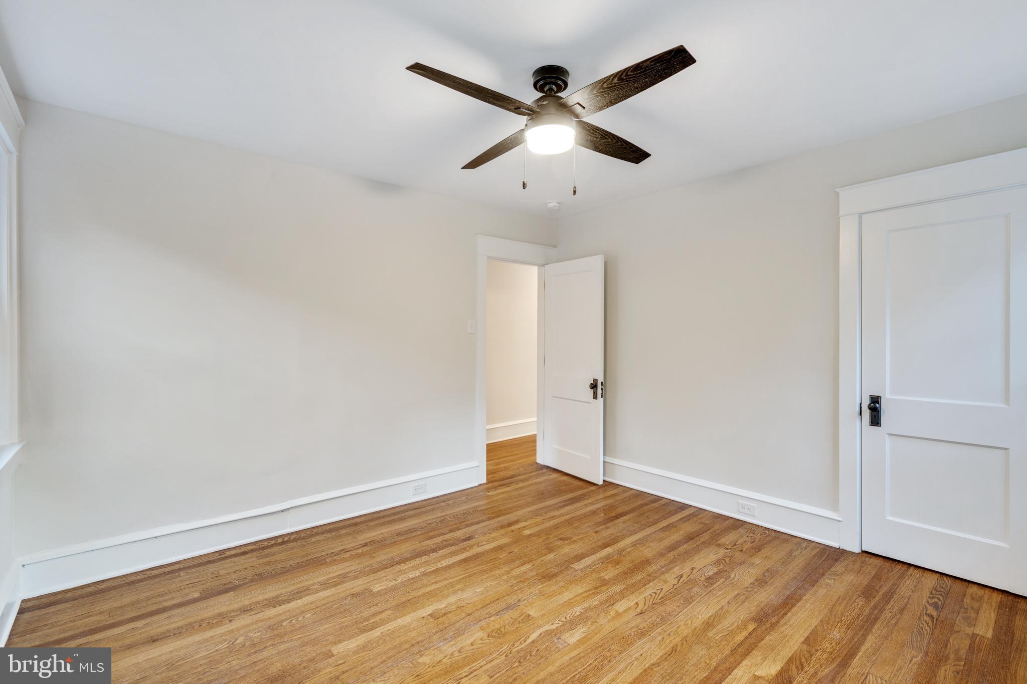 39 North Rolling Road Springfield, PA 19064 - Photo 72 of 119 an empty room with wooden floor and ceiling fan