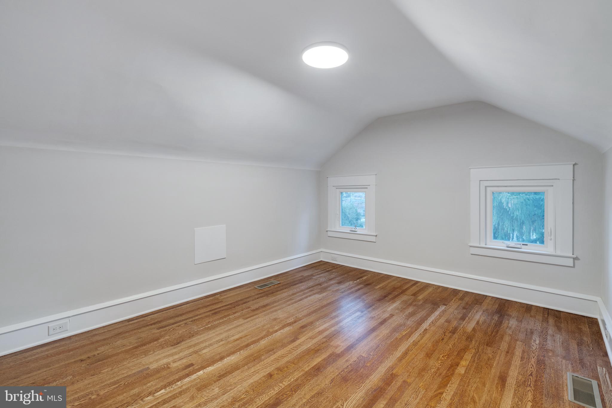 39 North Rolling Road Springfield, PA 19064 - Photo 77 of 119 wooden floor in an empty room with a window