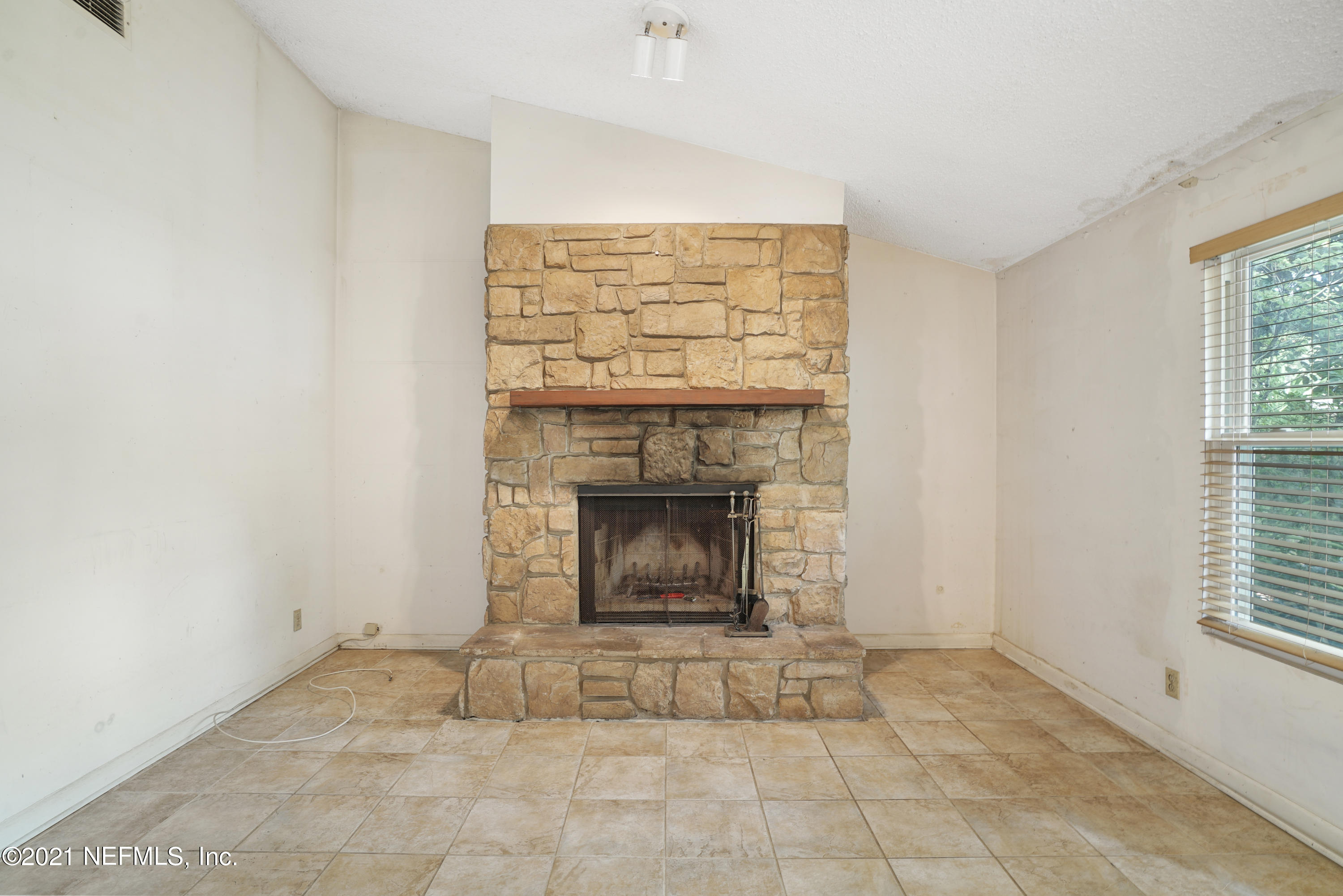 1925 Tanglewood Road Jacksonville Beach, FL 32250 - Photo 12 of 32 Wood burning fireplace