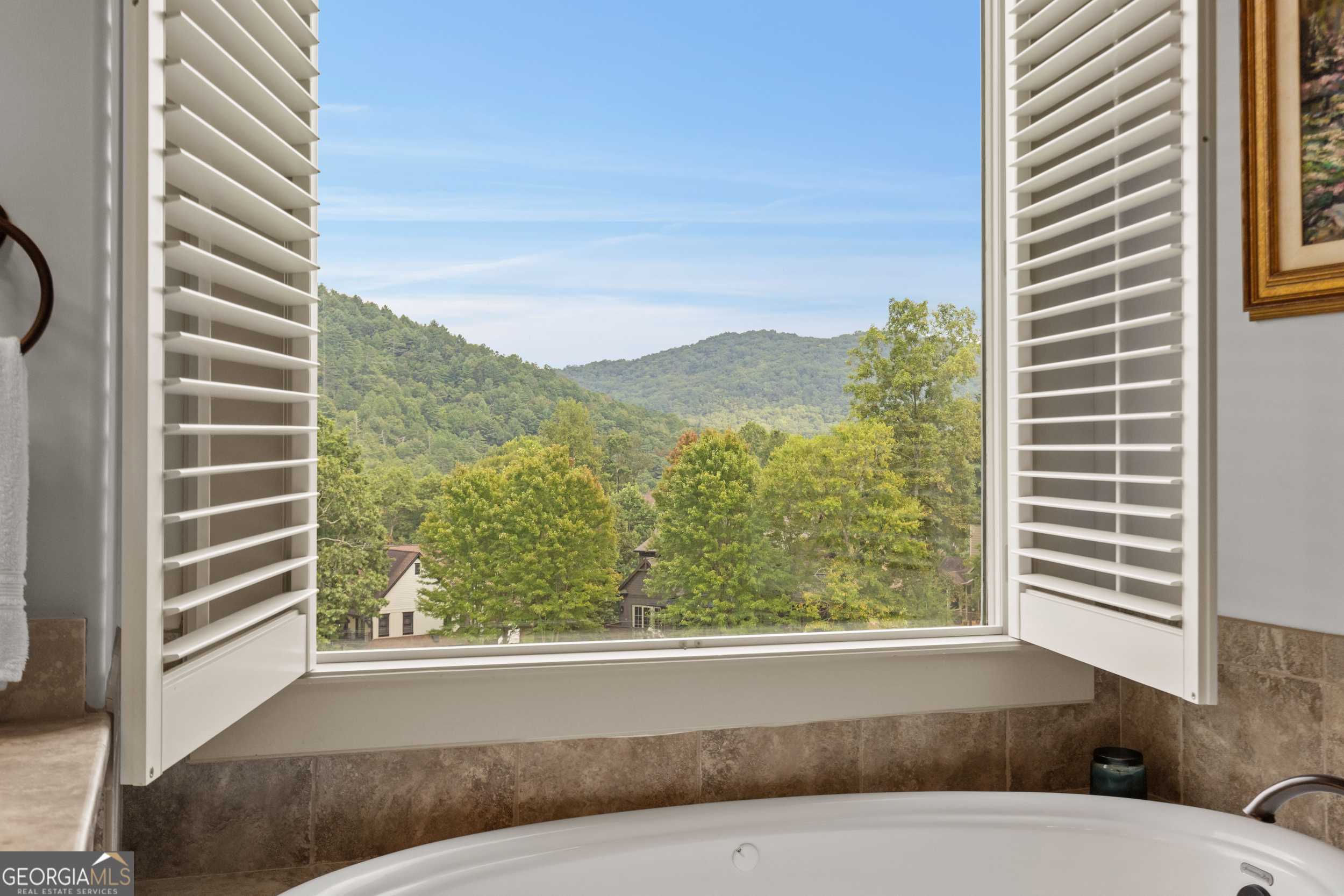 96 Fair View Drive Clayton, GA 30525 - Photo 23 of 66 a view of a bathtub and next to a window