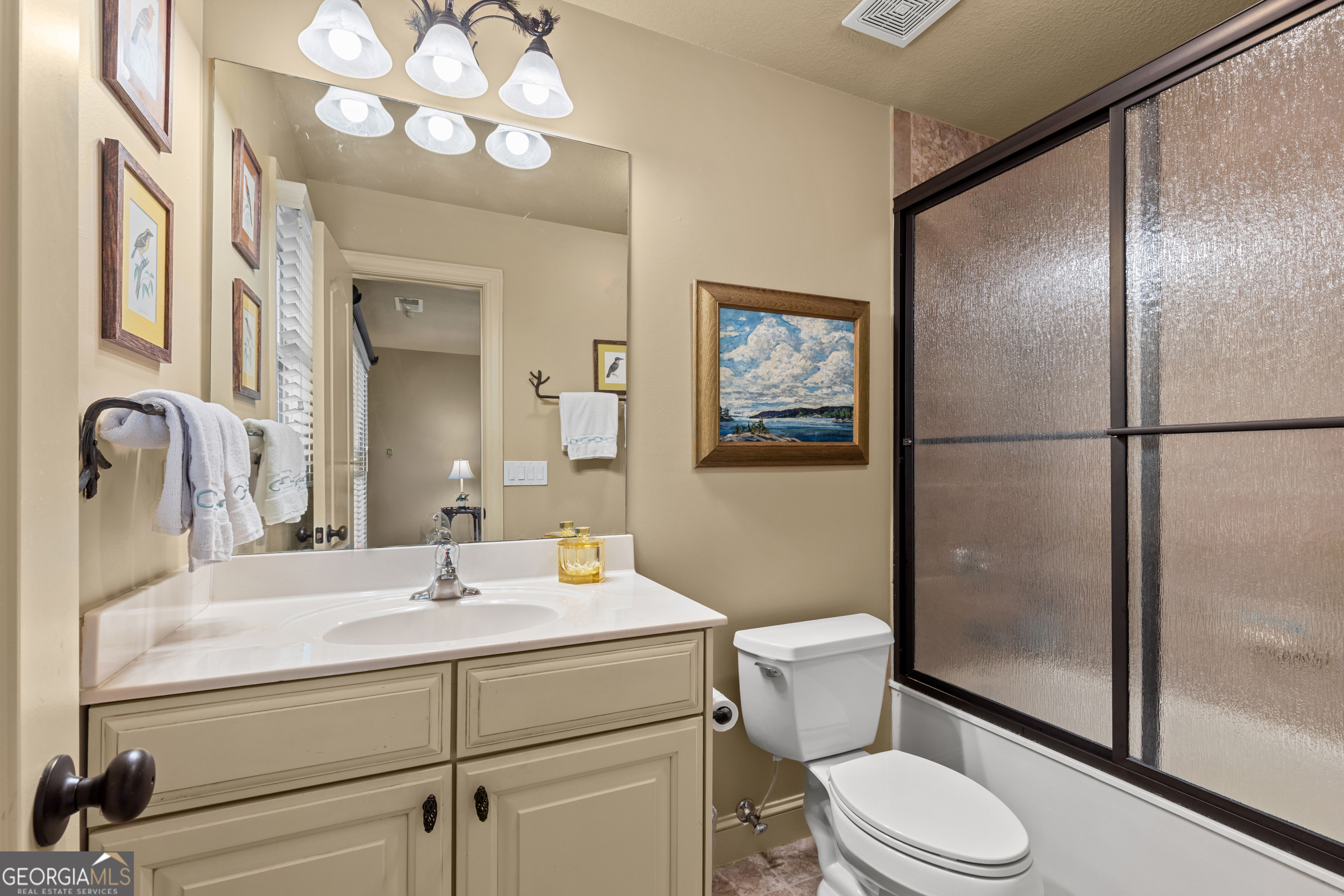 96 Fair View Drive Clayton, GA 30525 - Photo 31 of 66 a bathroom with a sink a toilet and shower