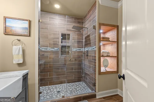 a spacious bedroom with a bed and a couch