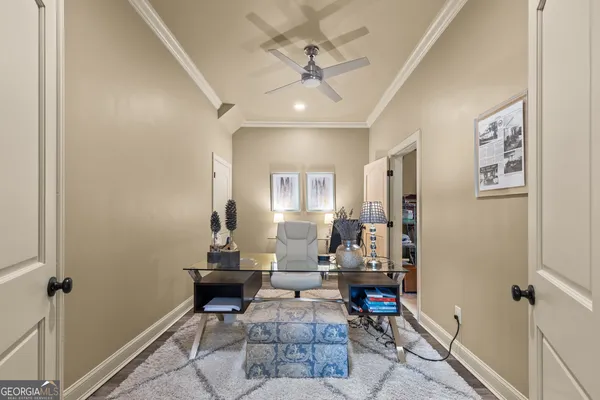 a spacious bedroom with a bed and a couch