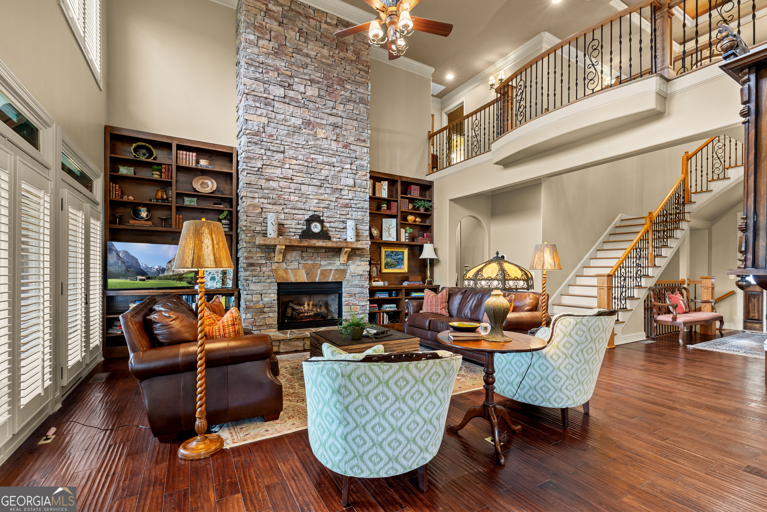 96 Fair View Drive Clayton, GA 30525 - Photo 8 of 66 a living room with furniture a fireplace and wooden floor
