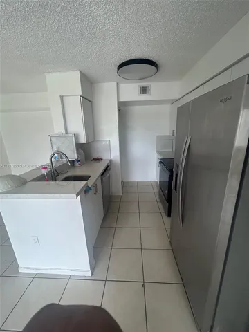 a bathroom with a sink a toilet and a bathtub